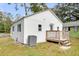 White sided home with a wooden deck and small yard at 1979 Macon Ave, North Charleston, SC 29405