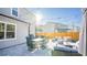 Patio with string lights, comfortable seating and dining area at 2009 Elvington Rd, Johns Island, SC 29455