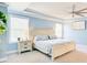 Bright bedroom featuring a comfortable bed, neutral tones, and a ceiling fan at 2009 Elvington Rd, Johns Island, SC 29455