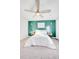 Bedroom with green accent wall and ceiling fan at 2009 Elvington Rd, Johns Island, SC 29455