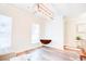 Bright dining room features hardwood floors and a charming drop leaf table at 2009 Elvington Rd, Johns Island, SC 29455