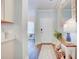 Entryway with hardwood floors, white console table, and mirror at 2009 Elvington Rd, Johns Island, SC 29455