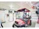 Garage with golf cart and ample storage options at 2009 Elvington Rd, Johns Island, SC 29455