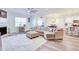 Cozy living room featuring a sectional sofa and fireplace at 2009 Elvington Rd, Johns Island, SC 29455