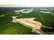 Aerial view of new home lots surrounded by trees and near industrial areas at 213 Terrace View Dr, Summerville, SC 29486