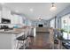 Open concept kitchen with island and dining area at 225 Sugarberry Ln, Moncks Corner, SC 29461