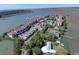Wide aerial view of community, waterways, and surrounding area at 30 Mariners Cay Dr, Folly Beach, SC 29439