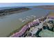 Aerial view of community with marina and waterway access at 30 Mariners Cay Dr, Folly Beach, SC 29439