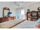 Main bedroom with a king-size bed and access to balcony at 30 Mariners Cay Dr, Folly Beach, SC 29439