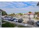 Parking lot with ample spaces and landscaping at 30 Mariners Cay Dr, Folly Beach, SC 29439