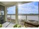 Relaxing screened porch with water view at 30 Mariners Cay Dr, Folly Beach, SC 29439