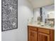 Wet bar with sink and nautical decor at 30 Mariners Cay Dr, Folly Beach, SC 29439