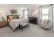 Spacious main bedroom with large bed, dresser, and comfortable seating at 314 Calm Water Way, Summerville, SC 29486