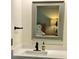 Vanity with sink and mirror reflecting bedroom at 3605 Bay Point Dr, Edisto Island,  29438