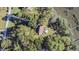 House with pool and yard surrounded by trees, near the water at 4415 Lord Proprietors Rd, Hollywood, SC 29449