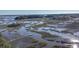 Wide aerial showcasing waterfront property and marshland at 4415 Lord Proprietors Rd, Hollywood, SC 29449