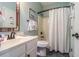 Clean bathroom with a white vanity and bathtub at 4415 Lord Proprietors Rd, Hollywood, SC 29449