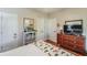 Cozy bedroom with a dresser, bookcase, and a comfy bed at 4415 Lord Proprietors Rd, Hollywood, SC 29449