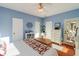 Spacious bedroom with a king-size bed and hardwood floors at 4415 Lord Proprietors Rd, Hollywood, SC 29449
