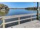 Relaxing wooden dock overlooking serene waterfront at 4415 Lord Proprietors Rd, Hollywood, SC 29449