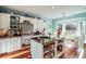 Bright kitchen featuring stainless steel appliances and an island with storage at 4415 Lord Proprietors Rd, Hollywood, SC 29449