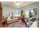 Home office with built-in shelving and hardwood floors at 4415 Lord Proprietors Rd, Hollywood, SC 29449