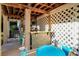 Outdoor patio with a bar, table, and chairs, perfect for entertaining at 4415 Lord Proprietors Rd, Hollywood, SC 29449