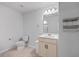 Clean bathroom with vanity, toilet, and mirrored medicine cabinet at 488 Sanctuary Park Dr, Summerville, SC 29486