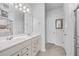 Double vanity bathroom with light-colored cabinets and a shower at 488 Sanctuary Park Dr, Summerville, SC 29486