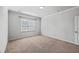 Empty bedroom with window, neutral walls and carpet at 488 Sanctuary Park Dr, Summerville, SC 29486
