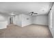 Large bedroom with ceiling fan, window, and access to a hallway at 488 Sanctuary Park Dr, Summerville, SC 29486