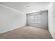 Bright bedroom featuring neutral walls, carpet, and a window at 488 Sanctuary Park Dr, Summerville, SC 29486