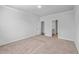 Spacious bedroom with neutral carpeting and an ensuite bathroom at 488 Sanctuary Park Dr, Summerville, SC 29486