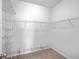 Walk-in closet with wire shelving and neutral carpeting at 488 Sanctuary Park Dr, Summerville, SC 29486