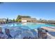 Inviting community pool with plenty of lounge chairs and a pool house at 488 Sanctuary Park Dr, Summerville, SC 29486