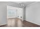 Sunlit dining area with hardwood floors and neutral decor at 488 Sanctuary Park Dr, Summerville, SC 29486