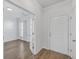 Bright entryway with hardwood floors, leading to an office and exterior door at 488 Sanctuary Park Dr, Summerville, SC 29486