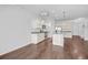 Open concept kitchen with island and hardwood floors at 488 Sanctuary Park Dr, Summerville, SC 29486