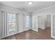 Spacious office with hardwood floors, large windows, and white walls at 488 Sanctuary Park Dr, Summerville, SC 29486