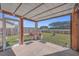 Relaxing screened porch overlooking backyard and trees at 488 Sanctuary Park Dr, Summerville, SC 29486