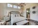 Elegant main bedroom with plush bedding and en-suite bathroom access at 587 Marsh Cove Cir, Summerville,  29486