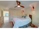 Comfortable bedroom with a queen bed, ceiling fan, and ample closet space at 941 Law Ln, Mount Pleasant,  29464