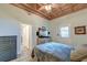 Bedroom with wood ceiling, dresser, and private door at 941 Law Ln, Mount Pleasant,  29464