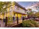 Back exterior view of charming yellow house with deck at 941 Law Ln, Mount Pleasant,  29464