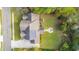 Aerial view of house with solar panels, backyard patio, and wooded surroundings at 1068 Blockade Runner Pkwy, Summerville, SC 29485