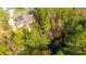 Aerial view of house, spacious backyard, and nearby nature at 1068 Blockade Runner Pkwy, Summerville, SC 29485