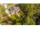 Aerial view of house showcasing backyard and solar panels at 1068 Blockade Runner Pkwy, Summerville, SC 29485