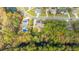 Aerial view of a house with solar panels and a large backyard at 1068 Blockade Runner Pkwy, Summerville, SC 29485