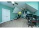 Multipurpose bonus room with home gym setup and workspace at 1068 Blockade Runner Pkwy, Summerville, SC 29485
