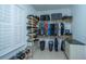 Well-organized walk-in closet with custom shelving and plenty of hanging space at 1068 Blockade Runner Pkwy, Summerville, SC 29485